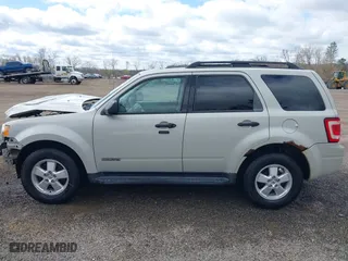 2008 Ford Escape XLT with VIN 1FMCU93ZX8KB33764, listed as a IAAI auction lot 42037456 with 195,047 mi miles. Bid and sale history available at carsss.com. Image 15.