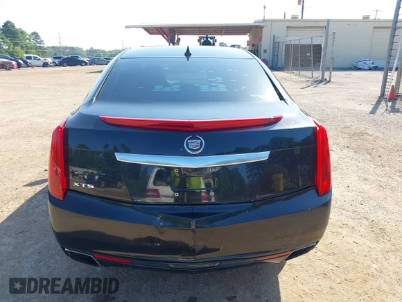 2013 Cadillac XTS Premium z VIN 2G61S5S34D9127996, wystawiony jako IAAI lot #41978539 z przebiegiem 185 157 mil mil oraz . Historia ofert i sprzedaży dostępna na DreamBid. Obrazek 18.