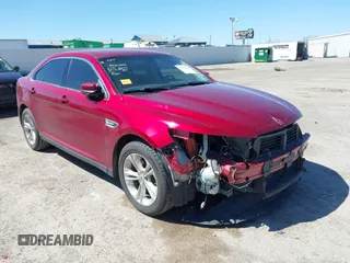 2013 Ford Taurus SEL with VIN 1FAHP2E8XDG231807, listed as a IAAI auction lot 41774166 with 120,639 mi miles and . Bid and sale history available at carsss.com. Image 1.