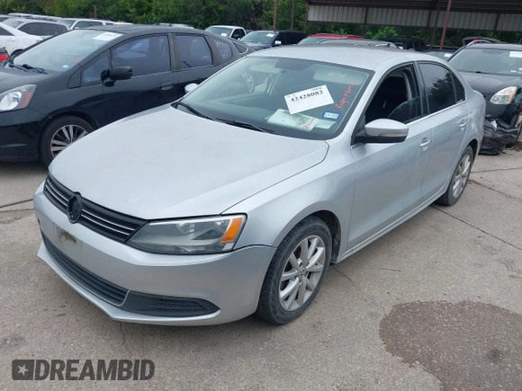 2014 Volkswagen Jetta SE with VIN 3VWD07AJ0EM239714, listed as a IAAI auction lot 42428082 with 124,221 mi miles and . Bid and sale history available at DreamBid. Image 2.
