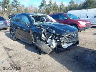 2016 Mazda CX-5 Grand Touring with VIN JM3KE4DY4G0909782, listed as a IAAI auction lot 41006111 with 30,135 mi miles. Bid and sale history available at carsss.com. Image 1.