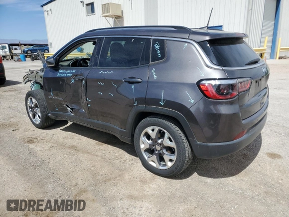 2021 Jeep Compass Limited with VIN 3C4NJCCBXMT559422, listed as a Copart auction lot 56952545 with 135,697 mi miles and Salvage title. Bid and sale history available at DreamBid. Image 2.
