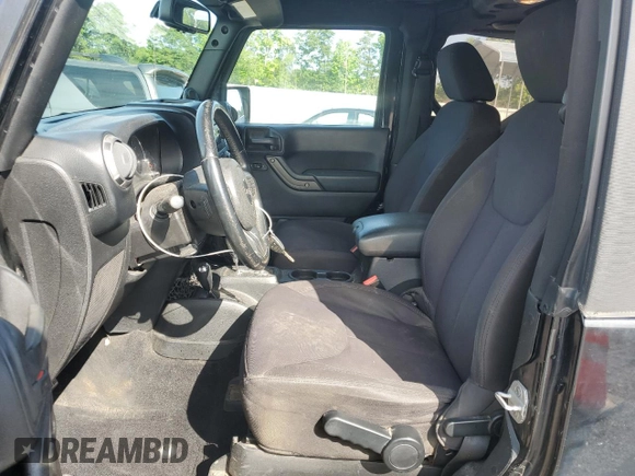 2014 Jeep Wrangler Sport z VIN 1C4AJWAG0EL147523, wystawiony jako Copart lot #59682015 z przebiegiem 196 258 mil mil oraz Szkoda całkowita • Salvage title. Historia ofert i sprzedaży dostępna na DreamBid. Obrazek 7.