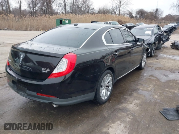 2014 Lincoln MKS with VIN 1LNHL9EK7EG609329, listed as a IAAI auction lot 41555819 with 89,849 mi miles. Bid and sale history available at carsss.com. Image 4.
