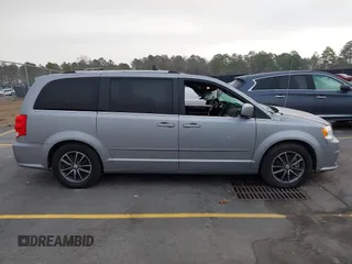 2017 Dodge Grand Caravan SXT with VIN 2C4RDGCG9HR677157, listed as a IAAI auction lot 41470342 with 66,611 mi miles and . Bid and sale history available at DreamBid. Image 13.