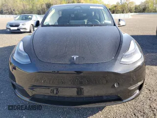 2024 Tesla Model Y Long Range z VIN 7SAYGAEE6RF106267, wystawiony jako Copart lot #53386675 z przebiegiem 8454 mil mil oraz Szkoda całkowita • Salvage title. Historia ofert i sprzedaży dostępna na DreamBid. Obrazek 5.