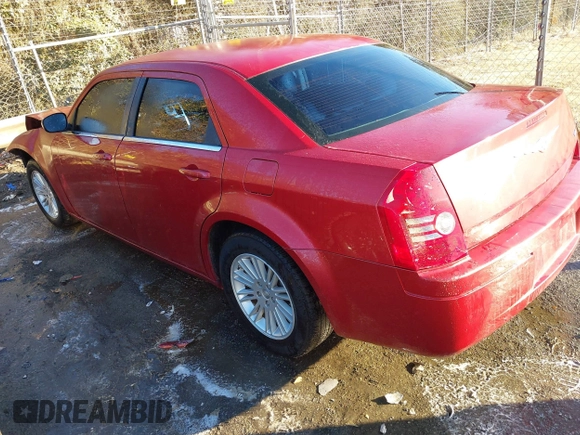 2009 Chrysler 300 LX with VIN 2C3KA43D69H565894, listed as a IAAI auction lot 41283079 with 233,098 mi miles. Bid and sale history available at carsss.com. Image 3.