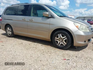 2006 Honda Odyssey EX with VIN 5FNRL38406B085097, listed as a IAAI auction lot 42632328 with 229,482 mi miles and . Bid and sale history available at DreamBid. Image 1.
