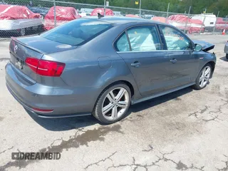 2017 Volkswagen Jetta GLI with VIN 3VW5T7AJ3HM253445, listed as a IAAI auction lot 42204260 with 61,057 mi miles and . Bid and sale history available at DreamBid. Image 4.