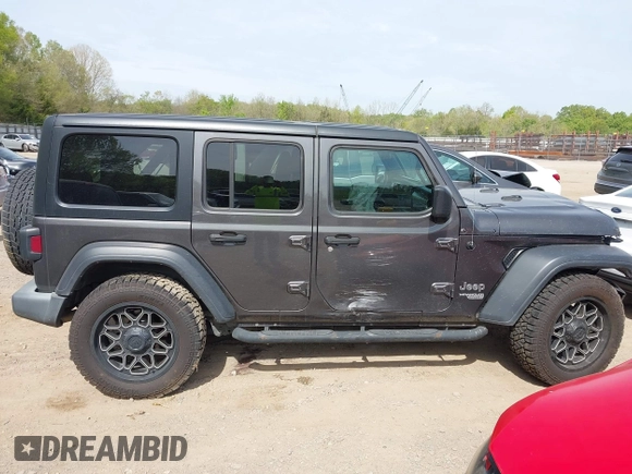 2019 Jeep Wrangler Unlimited Sport S with VIN 1C4HJXDG2KW516571, listed as a IAAI auction lot 42043223 with 58,131 mi miles and . Bid and sale history available at DreamBid. Image 13.