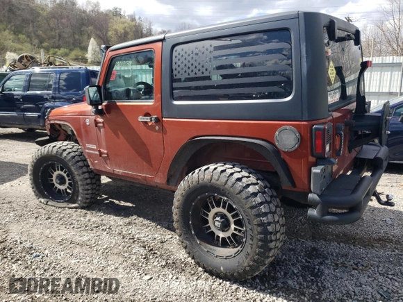 2014 Jeep Wrangler Sport with VIN 1C4AJWAG0EL184815, listed as a Copart auction lot 50307365 with 139,921 mi miles and Salvage title. Bid and sale history available at DreamBid. Image 2.