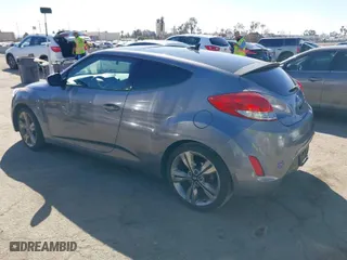 2016 Hyundai Veloster with VIN KMHTC6AD8GU296991, listed as a IAAI auction lot 41720599 with 108,121 mi miles. Bid and sale history available at carsss.com. Image 3.