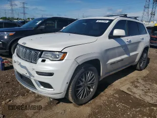 2017 Jeep Grand Cherokee Summit with VIN 1C4RJFJT9HC736624, listed as a Copart auction lot 62197245 with 217,469 mi miles and Salvage title. Bid and sale history available at DreamBid. Image 1.