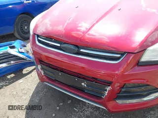 2015 Ford Escape Titanium z VIN 1FMCU9J91FUC58933, wystawiony jako IAAI lot #42583736 z przebiegiem 147 359 mil mil oraz . Historia ofert i sprzedaży dostępna na DreamBid. Obrazek 6.