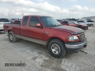 2001 Ford F-150 XL with VIN 1FTRX17W71NB71934, listed as a Copart auction lot 54231605 with 257,867 mi miles and Salvage title. Bid and sale history available at DreamBid. Image 4.