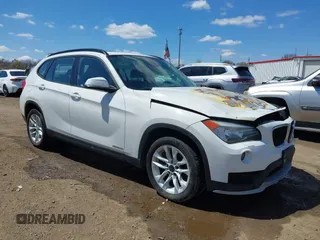 2015 BMW X1 xDrive28i with VIN WBAVL1C50FVY31341, listed as a IAAI auction lot 42048460 with 1 mi miles. Bid and sale history available at carsss.com. Image 1.