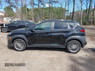 2020 Hyundai Kona SEL with VIN KM8K2CAA0LU401200, listed as a IAAI auction lot 41883466 with 47,796 mi miles and . Bid and sale history available at carsss.com. Image 14.