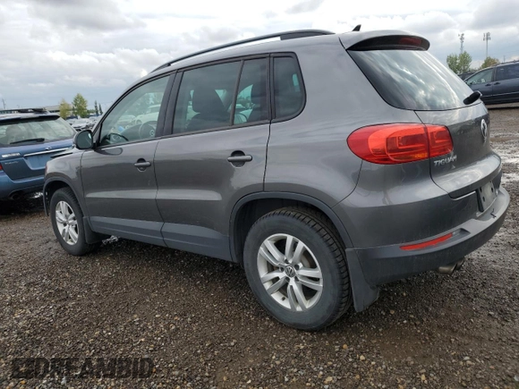 2017 Volkswagen Tiguan with VIN WVGHV7AX1HK017717, listed as a Copart auction lot 64948373 with 77,825 mi miles and Salvage title. Bid and sale history available at DreamBid. Image 2.