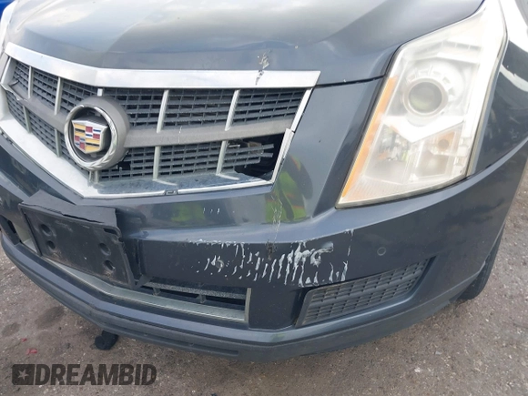 2012 Cadillac SRX Luxury Collection z VIN 3GYFNAE39CS659562, wystawiony jako IAAI lot #42109525 z przebiegiem 151 051 mil mil oraz . Historia ofert i sprzedaży dostępna na DreamBid. Obrazek 6.