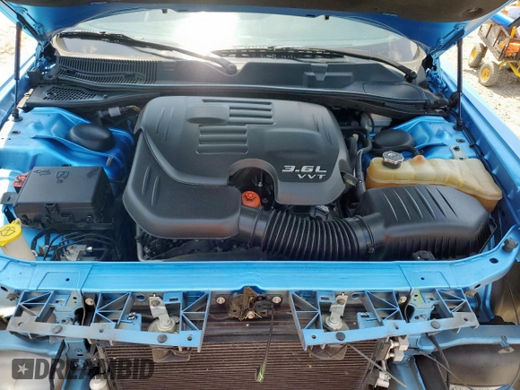 2015 Dodge Challenger SXT Plus with VIN 2C3CDZBG7FH877979, listed as a Copart auction lot 56392215 with 125,681 mi miles and Salvage title. Bid and sale history available at DreamBid. Image 11.