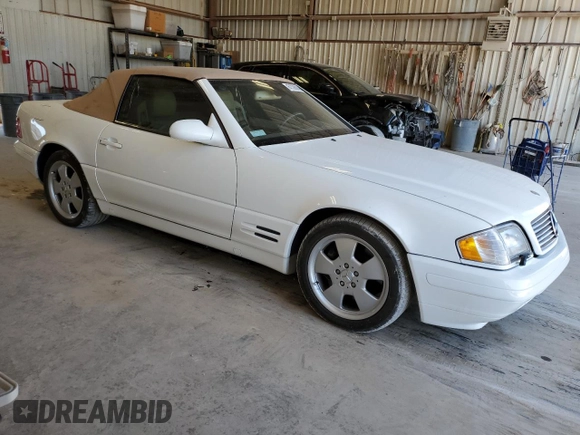 1999 Mercedes-Benz SL-Class with VIN WDBFA68F2XF179134, listed as a Copart auction lot 67335014 with 68,406 mi miles and Clean Title. Bid and sale history available at carsss.com. Image 4.