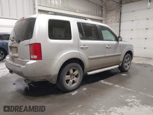 2011 Honda Pilot EX-L with VIN 5FNYF4H66BB029802, listed as a IAAI auction lot 42101545 with 240,127 mi miles and . Bid and sale history available at carsss.com. Image 4.