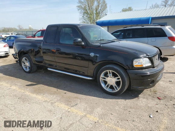 2000 Ford F-150 XL with VIN 2FTRX07L6YCA93968, listed as a Copart auction lot 52541195 with 252,092 mi miles and Salvage title. Bid and sale history available at DreamBid. Image 4.