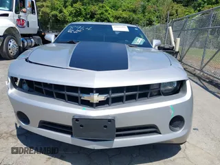 2013 Chevrolet Camaro LS z VIN 2G1FA1E37D9113674, wystawiony jako IAAI lot #42092399 z przebiegiem 138 908 mil mil oraz . Historia ofert i sprzedaży dostępna na DreamBid. Obrazek 12.