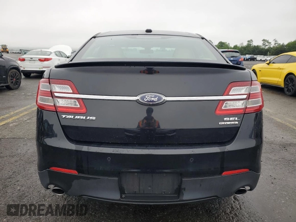 2016 Ford Taurus SEL with VIN 1FAHP2E88GG137607, listed as a Copart auction lot 61356505 with 33,768 mi miles and Salvage title. Bid and sale history available at DreamBid. Image 6.