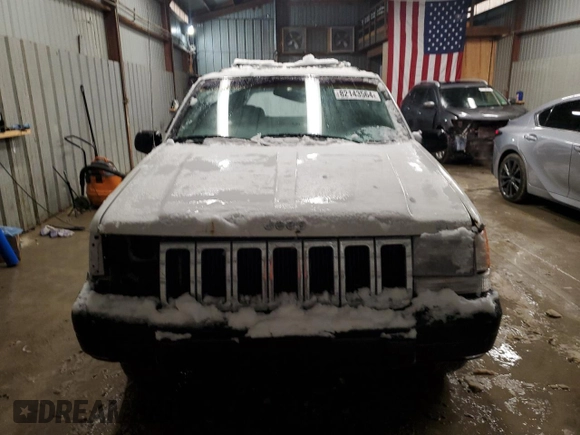 1995 Jeep Grand Cherokee Laredo with VIN 1J4GZ58S6SC630947, listed as a Copart auction lot 82143564 with 267,946 mi miles and Salvage Title. Bid and sale history available at carsss.com. Image 5.