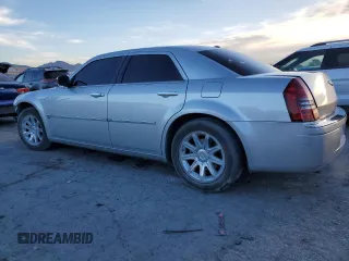 2006 Chrysler 300 C with VIN 2C3KA63H36H480201, listed as a Copart auction lot 44947715 with 145,831 mi miles and Salvage Title. Bid and sale history available at carsss.com. Image 2.