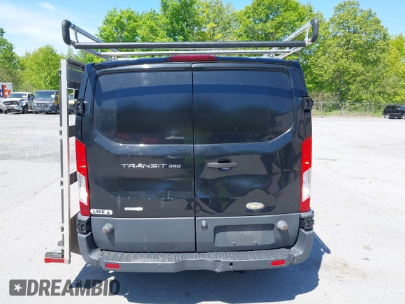 2015 Ford Transit Cargo z VIN 1FTBW2YG7FKA20201, wystawiony jako IAAI lot #42253463 z przebiegiem 83 235 mil mil oraz . Historia ofert i sprzedaży dostępna na DreamBid. Obrazek 16.
