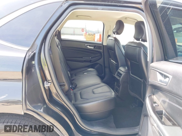 2015 Ford Edge Titanium z VIN 2FMTK3K87FBC06852, wystawiony jako IAAI lot #42335238 z przebiegiem 187 256 mil mil oraz . Historia ofert i sprzedaży dostępna na DreamBid. Obrazek 8.