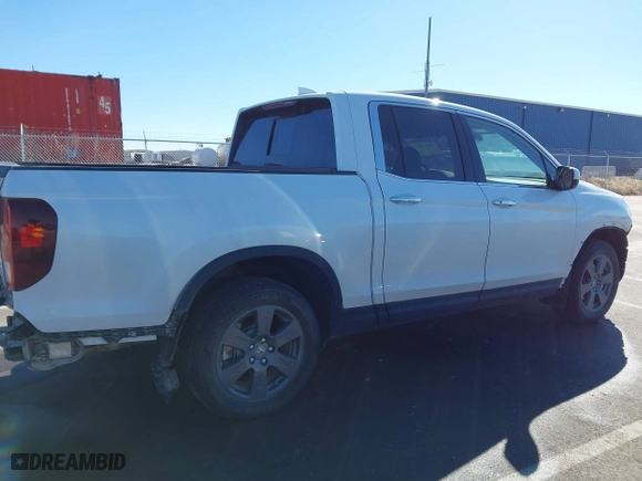 2020 Honda Ridgeline RTL-E with VIN 5FPYK3F76LB005008, listed as a IAAI auction lot 41662580 with 33,987 mi miles. Bid and sale history available at carsss.com. Image 14.