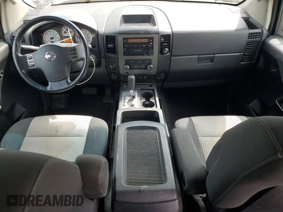 2012 Nissan Titan SV with VIN 1N6AA0EJ2CN311162, listed as a Copart auction lot 54403125 with 233,662 mi miles and Salvage title. Bid and sale history available at DreamBid. Image 8.