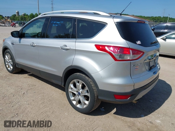 2015 Ford Escape Titanium with VIN 1FMCU9J94FUA65188, listed as a IAAI auction lot 42516728 with 65,969 mi miles and . Bid and sale history available at DreamBid. Image 3.