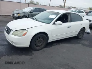 2003 Nissan Altima S with VIN 1N4AL11D03C188269, listed as a IAAI auction lot 41916866 with 210,623 mi miles. Bid and sale history available at carsss.com. Image 2.