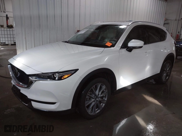 2021 Mazda CX-5 Grand Touring with VIN JM3KFADM3M0312143, listed as a IAAI auction lot 41606582 with 46,515 mi miles. Bid and sale history available at carsss.com. Image 17.