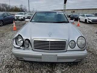 1997 Mercedes-Benz E-Class with VIN WDBJF55F1VA309179, listed as a Copart auction lot 79222994 with 122,100 mi miles and Salvage Title. Bid and sale history available at carsss.com. Image 5.