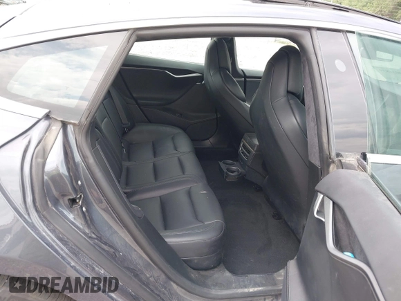 2019 Tesla Model S 75D with VIN 5YJSA1E22KF300407, listed as a IAAI auction lot 40034839 with 59,178 mi miles and . Bid and sale history available at DreamBid. Image 8.