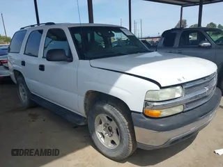 2004 Chevrolet Tahoe LS with VIN 1GNEC13V24J290596, listed as a IAAI auction lot 41956638 with 199,004 mi miles. Bid and sale history available at carsss.com. Image 1.
