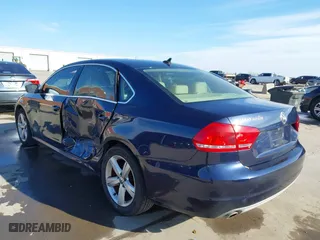 2012 Volkswagen Passat SE w/Sunroof with VIN 1VWBH7A35CC077207, listed as a IAAI auction lot 41351317 with 136,904 mi miles. Bid and sale history available at carsss.com. Image 3.
