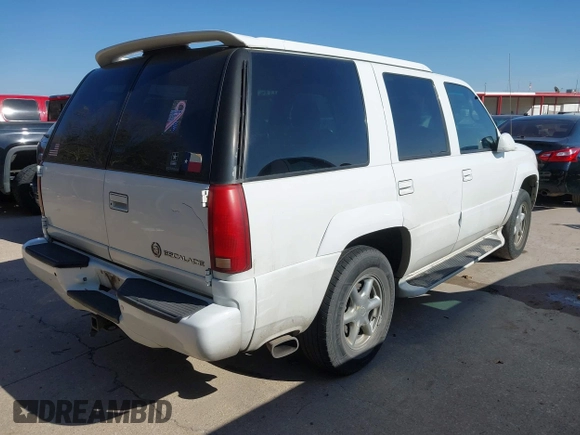 2000 Cadillac Escalade with VIN 1GYEK13R9YR149637, listed as a IAAI auction lot 41599887 with 206,835 mi miles and . Bid and sale history available at DreamBid. Image 4.