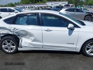 2018 Ford Fusion S z VIN 3FA6P0UU1JR204607, wystawiony jako IAAI lot #41985269 z przebiegiem 116 517 mil mil oraz . Historia ofert i sprzedaży dostępna na DreamBid. Obrazek 13.