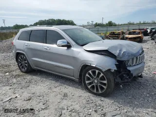 2018 Jeep Grand Cherokee Overland with VIN 1C4RJFCG9JC317856, listed as a Copart auction lot 55216254 with 77,340 mi miles and Salvage Title. Bid and sale history available at carsss.com. Image 4.