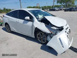 2022 Toyota Prius L Eco with VIN JTDKAMFU1N3177444, listed as a IAAI auction lot 41812402 with 44,666 mi miles. Bid and sale history available at carsss.com. Image 1.