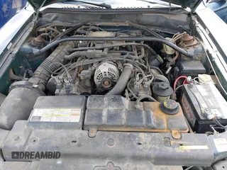 1996 Ford Mustang GT z VIN 1FALP42XXTF137304, wystawiony jako IAAI lot #42464808 z przebiegiem 166 565 mil mil oraz . Historia ofert i sprzedaży dostępna na DreamBid. Obrazek 10.