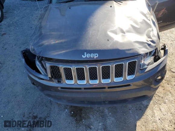 2016 Jeep Compass Sport with VIN 1C4NJCBB4GD765153, listed as a Copart auction lot 87743315 with 107,933 mi miles and Salvage title. Bid and sale history available at DreamBid. Image 12.