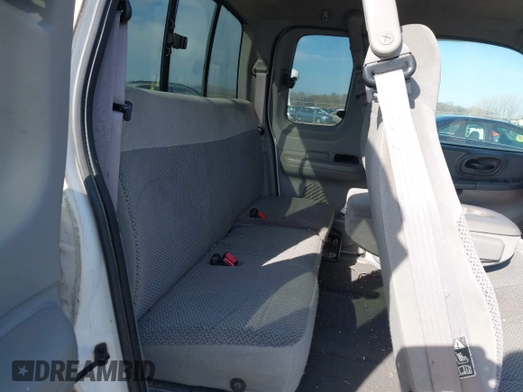 1999 Ford F-150 XL with VIN 2FTRX18L7XCA69231, listed as a IAAI auction lot 41880011 with 1 mi miles. Bid and sale history available at carsss.com. Image 8.