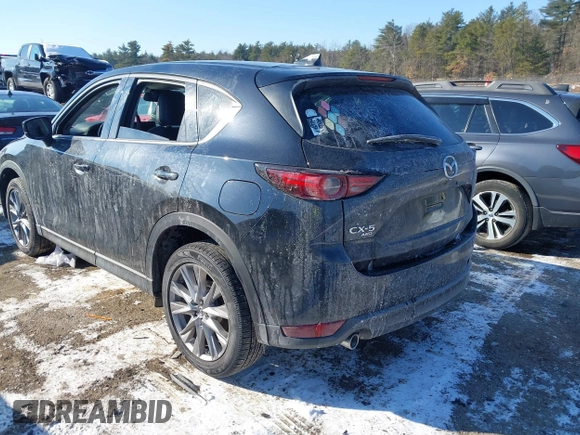 2020 Mazda CX-5 Grand Touring with VIN JM3KFBDM7L1807685, listed as a IAAI auction lot 41392313 with 91,729 mi miles and . Bid and sale history available at carsss.com. Image 3.